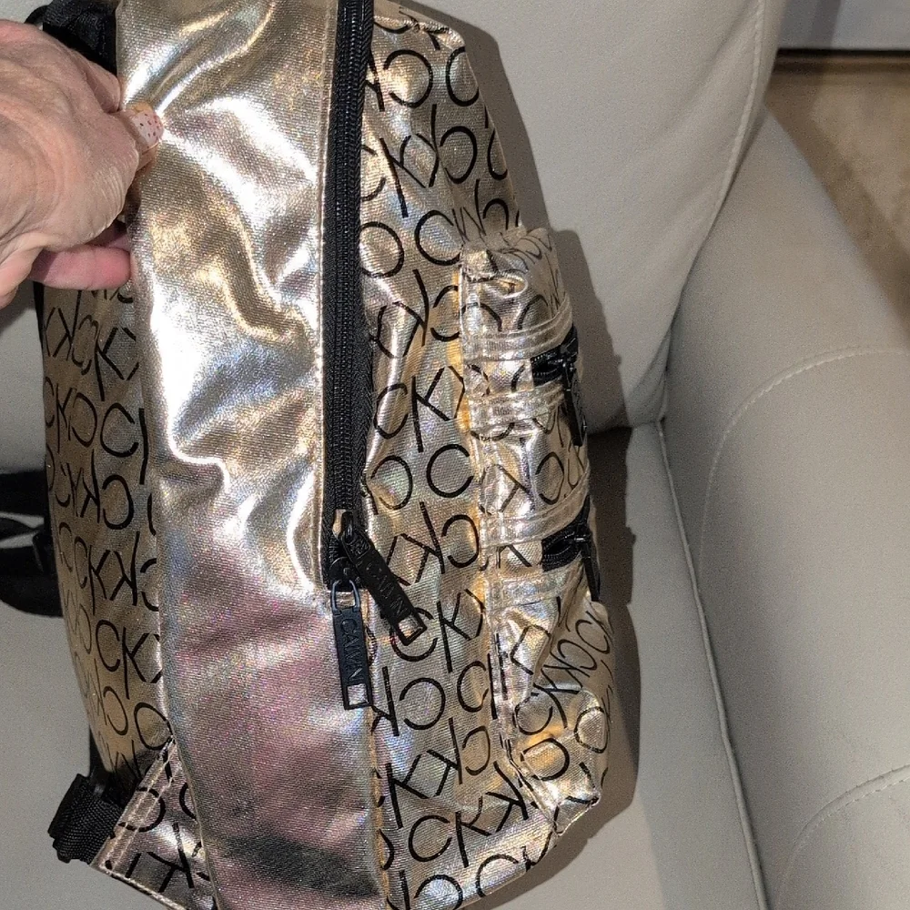 Calvin Klein Metallic Gold Backpack with Black Logo